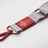 Cross-shaped mobile phone holder made of woven tape with metal plate (Production)