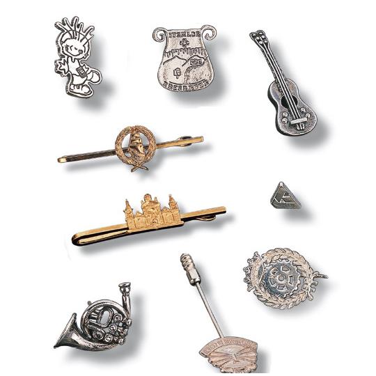 3D-shaped pin with gold and...